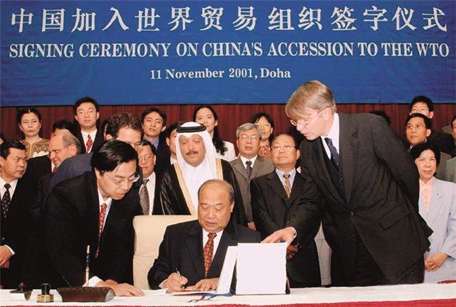 1.3.6-003  中國外經貿部部長石廣生在卡塔爾首都多哈代表中國政府在中國加入世貿組織的議定書上簽字_副本.jpg